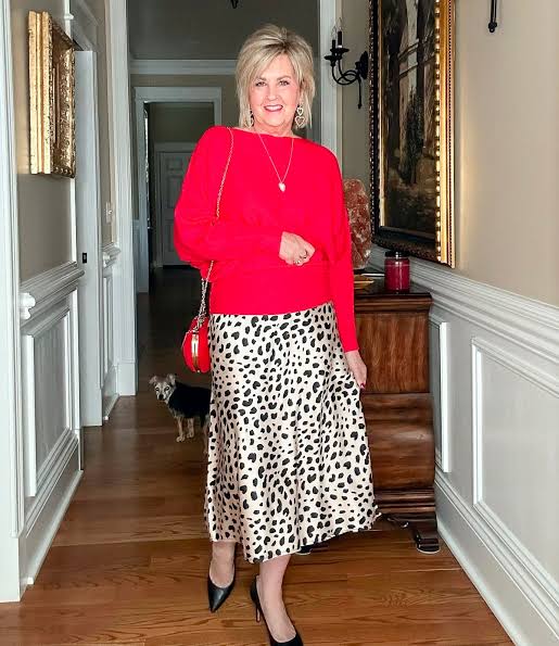 Red Off-the-Shoulder Sweater and Leopard Print Midi Skirt Red Off-the-Shoulder Sweater and Leopard Print Midi Skirt — Date Night Outfits 2027 for Women Over 50