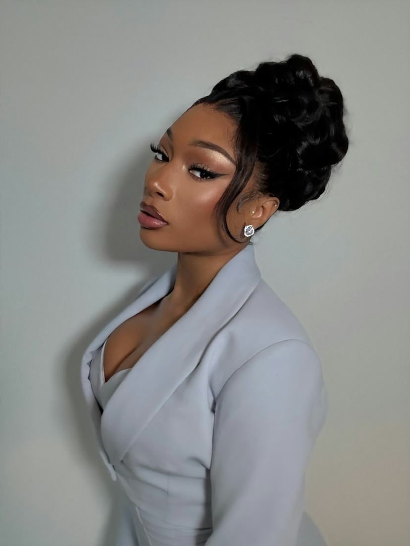 Voluminous Black High Bun — Graduation Updos 2027