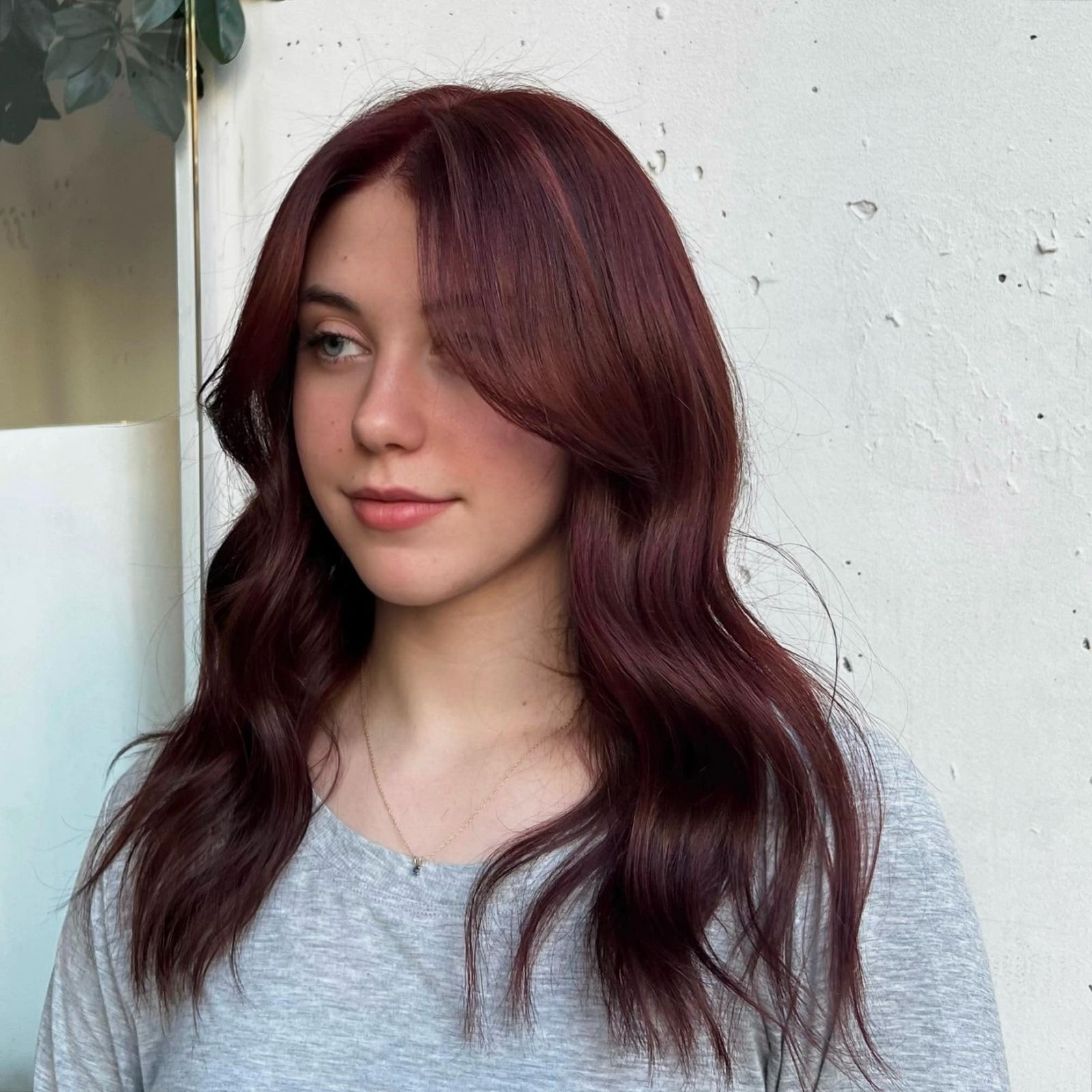 Deep Red Hair With Side Swept Bangs Deep Red Hair With Side Swept Bangs — Hair Color 2027 for Square Face