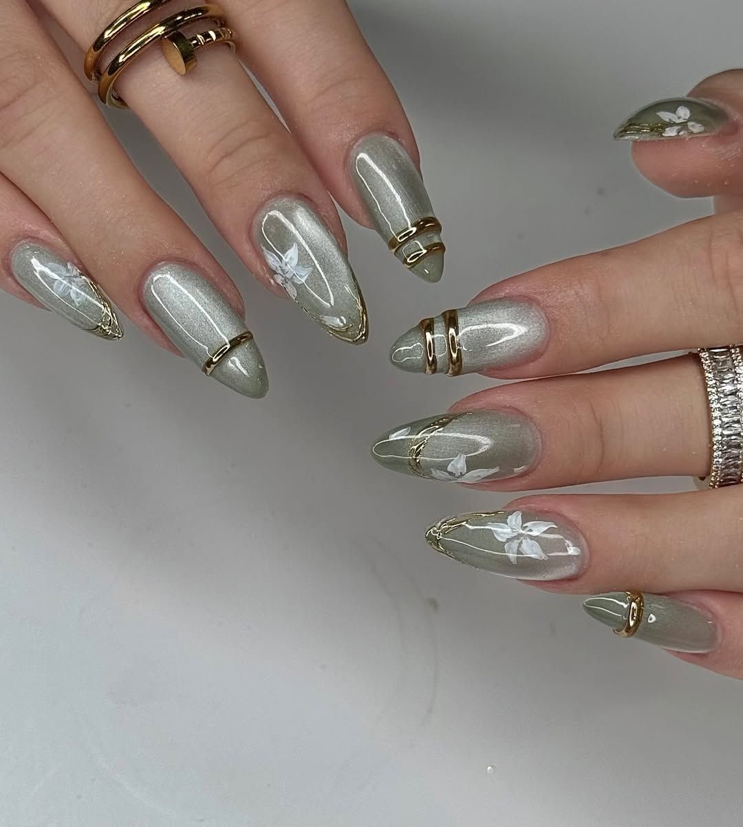 Muted Sage Green Cat Eye with Floral Art Muted Sage Green Cat Eye with Floral Art — Cat Eye Nails 2027