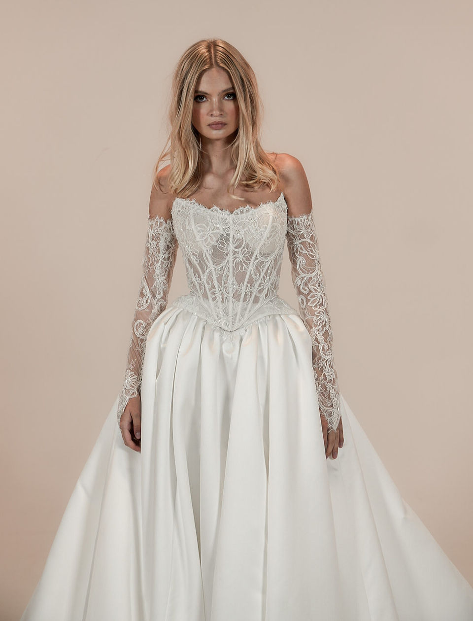 Intricate Craftsmanship: Lace Sleeves on a Ballgown — Wedding Dress Trends 2027