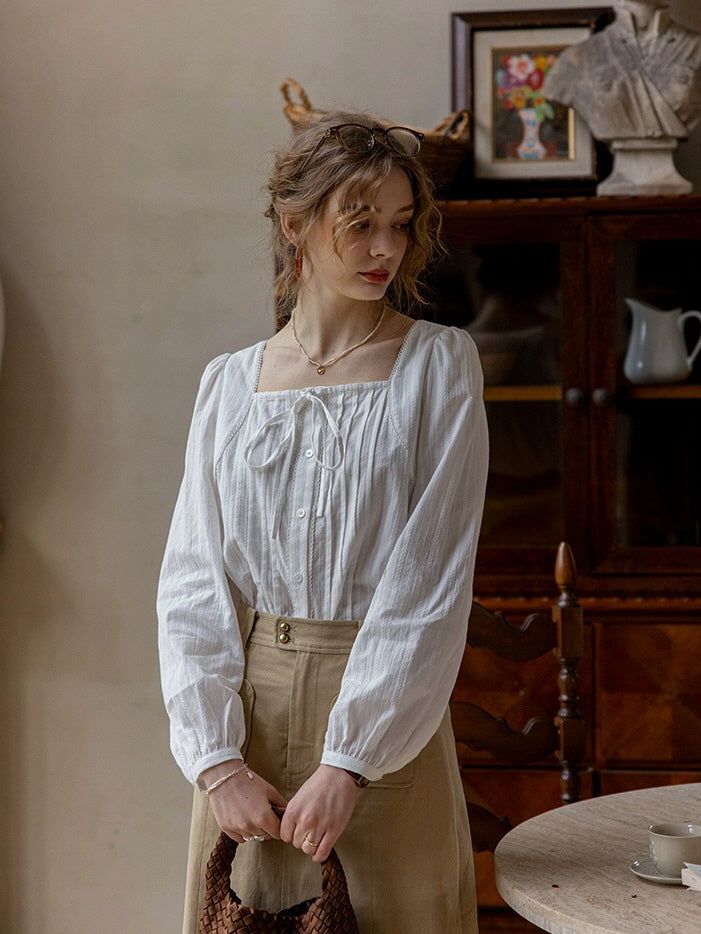 White Cotton Puff Sleeve Blouse with Square Neckline and Beige Midi Skirt White Cotton Puff Sleeve Blouse with Square Neckline and Beige Midi Skirt — Puff Sleeve Blouse Outfits 2027