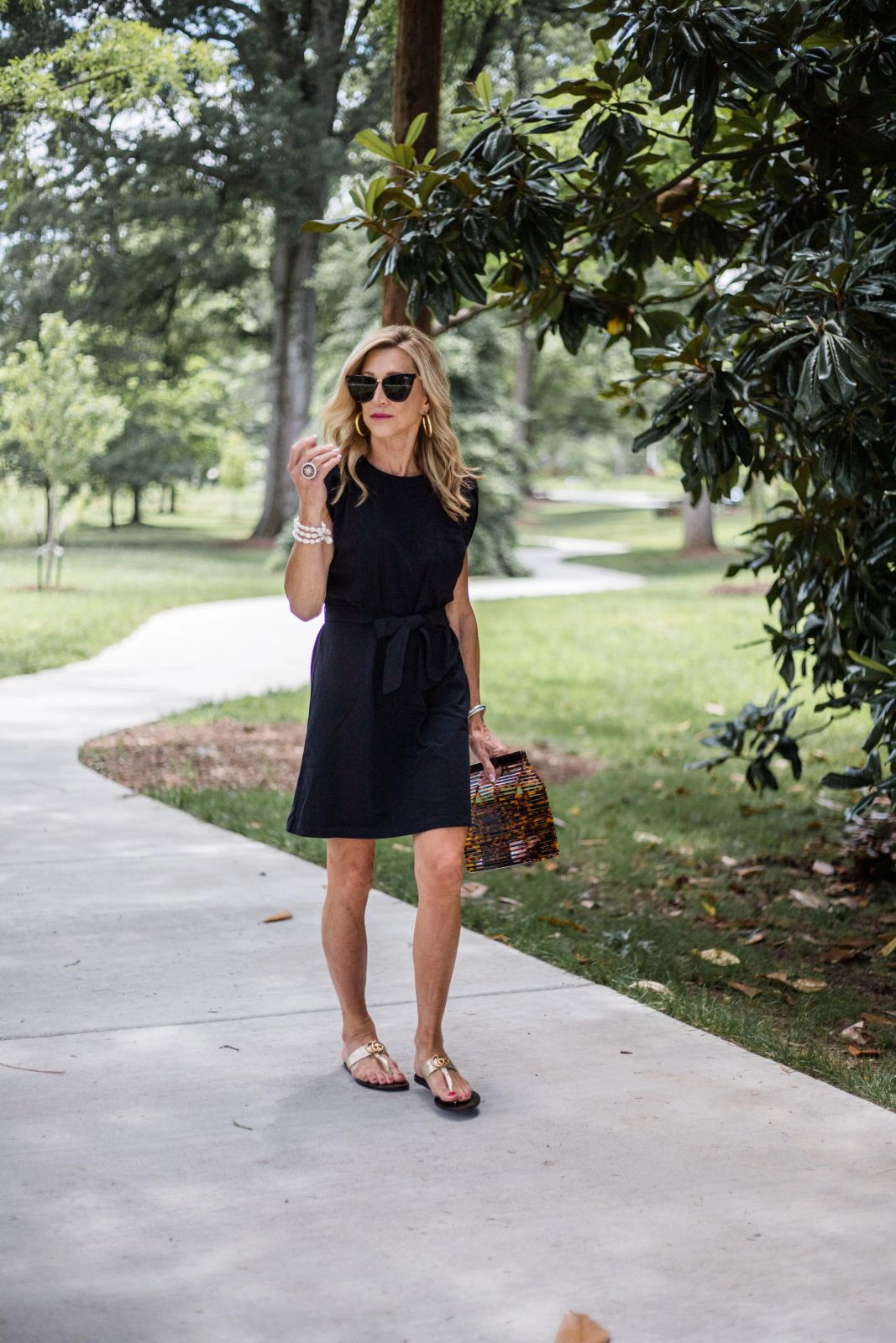 Black Jersey T-Shirt Dress with Tie Waist and Gold Sandals Black Jersey T-Shirt Dress with Tie Waist and Gold Sandals — Little Black Dress Outfits 2027