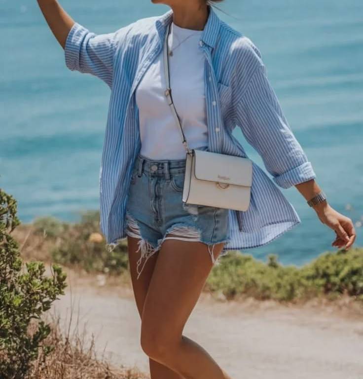 Ripped Denim Shorts Layered with Striped Button-Down Ripped Denim Shorts Layered with Striped Button-Down — Summer Outfits 2027 with Shorts