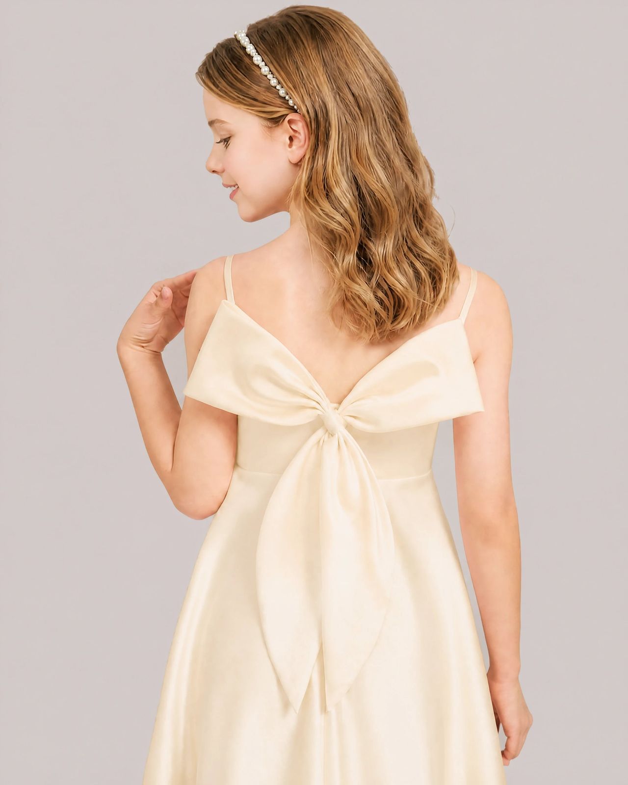 Ivory Satin Fit-and-Flare with a Statement Back Bow Ivory Satin Fit-and-Flare with a Statement Back Bow — Junior Bridesmaid Dress 2027