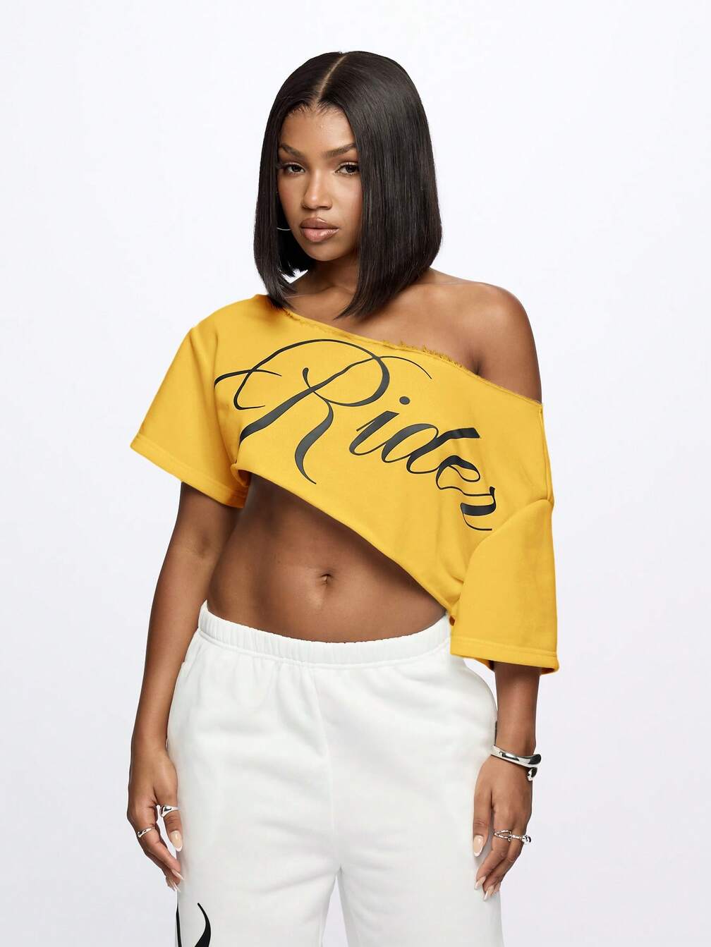 Yellow Distressed Off-Shoulder Crop Top with Black Text Yellow Distressed Off-Shoulder Crop Top with Black Text — Summer Crop Top Outfits 2027