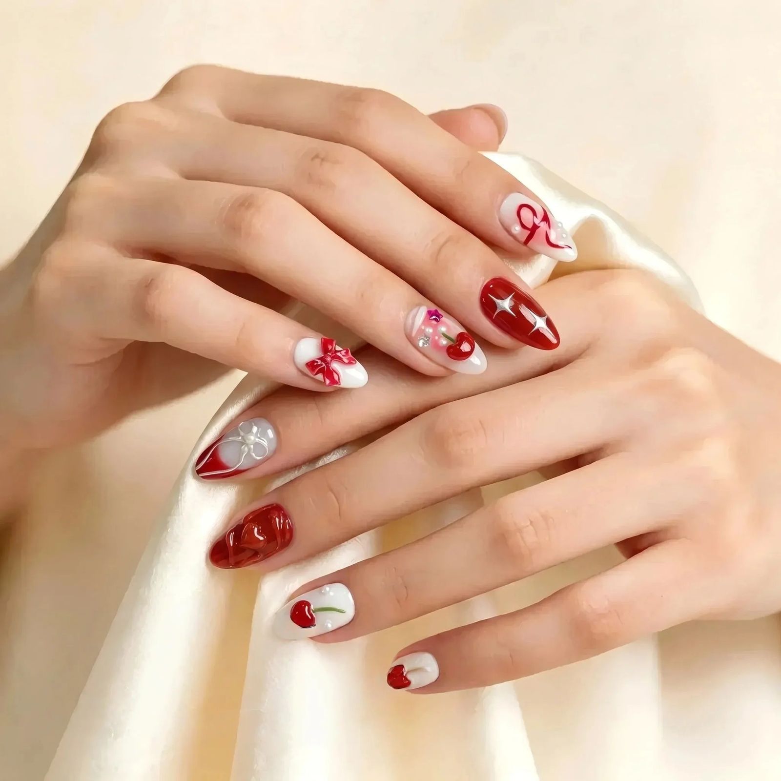 Medium Almond Glossy Red 3D Bows & Cherries Medium Almond Glossy Red 3D Bows & Cherries — Simple Bow Nails 2027