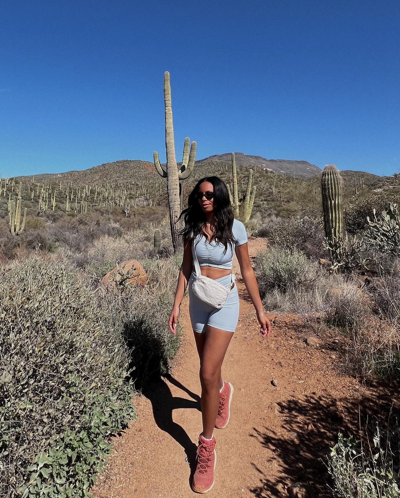 Light Blue Crop Top and Shorts with Crossbody Bag — Athletic Hiking Outfits 2027