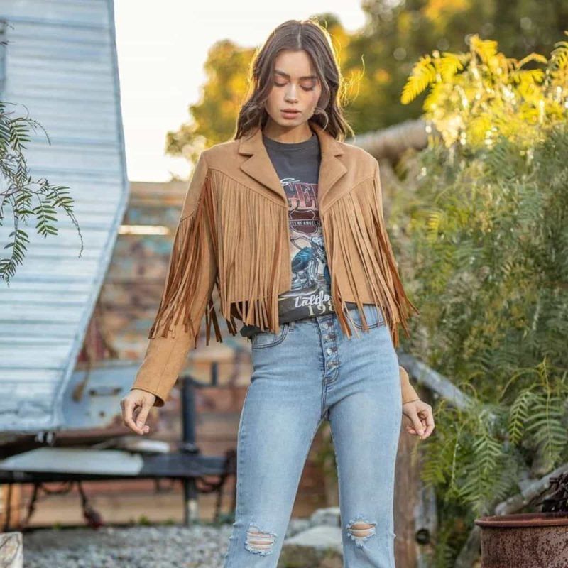 Dramatic Fringe: Tan Suede Jacket with Graphic Tee and Ripped Jeans Dramatic Fringe: Tan Suede Jacket with Graphic Tee and Ripped Jeans — Fringe Jacket Outfits 2027