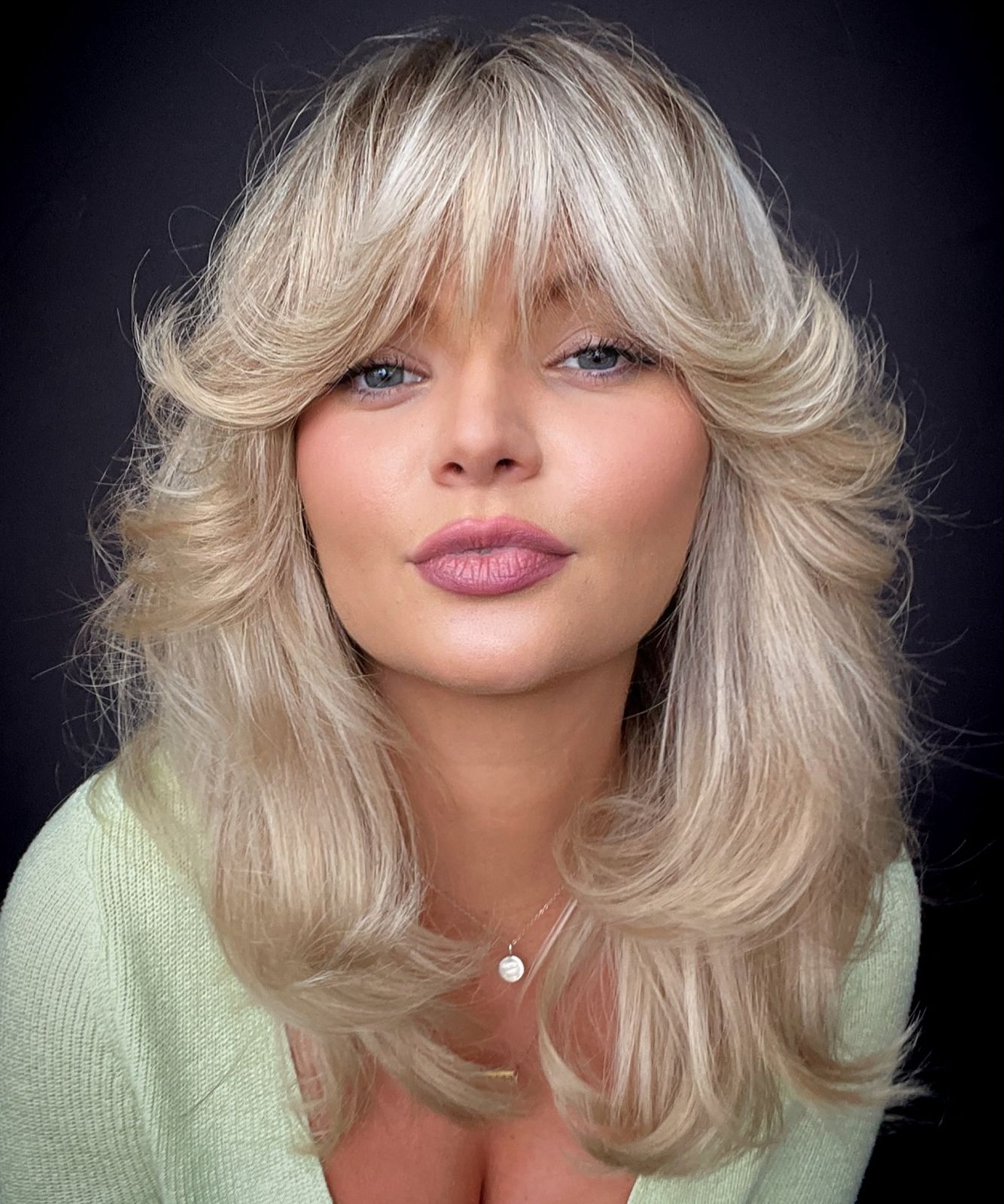 Platinum Long Layers With Wispy Bangs Platinum Long Layers With Wispy Bangs — Winter Haircuts 2027 for Round Faces