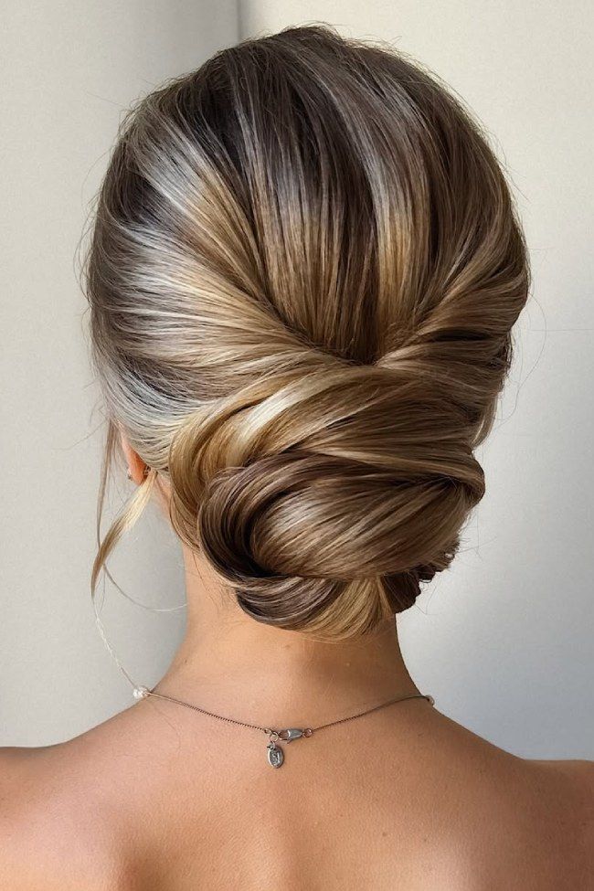 Sleek Twisted Low Bun Dark Blonde Balayage — Knotted Bun Hairstyles 2027