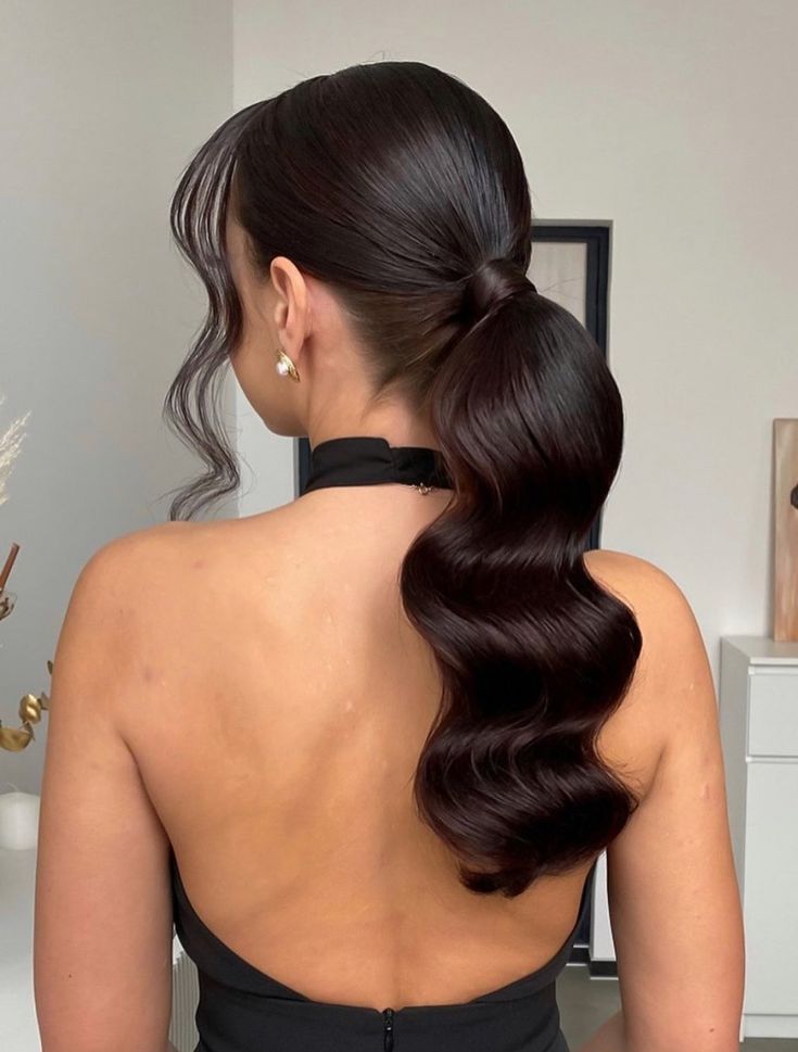 Sleek Low Ponytail With Uniform Waves — Bridesmaid Ponytail Hairstyles 2027