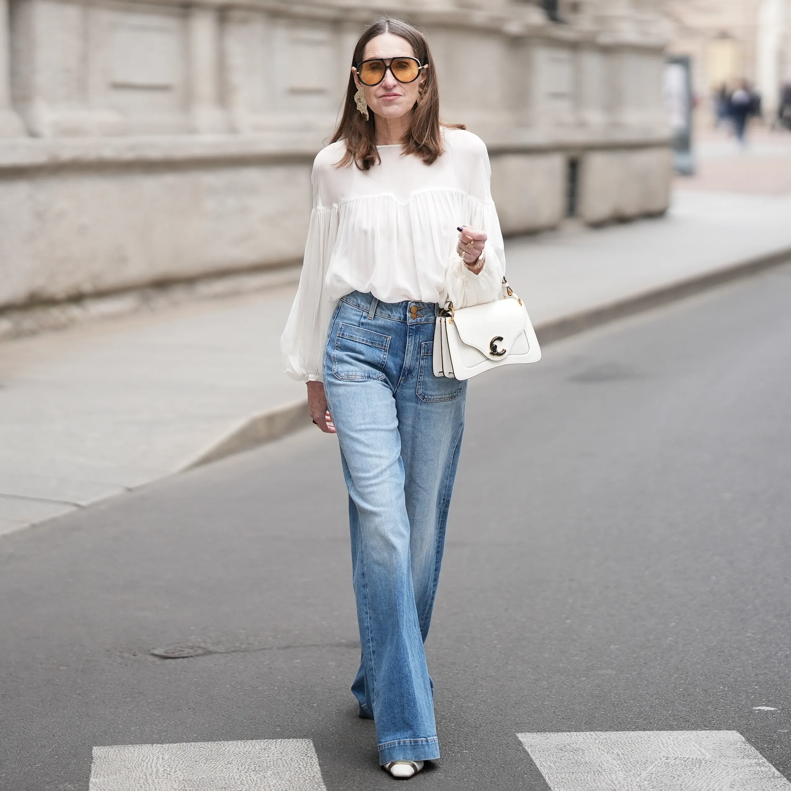 Voluminous Style: Extra-Wide Bootcut Jeans with White Blouse and Mules — Bootcut Jeans Outfits 2027 with Sandals