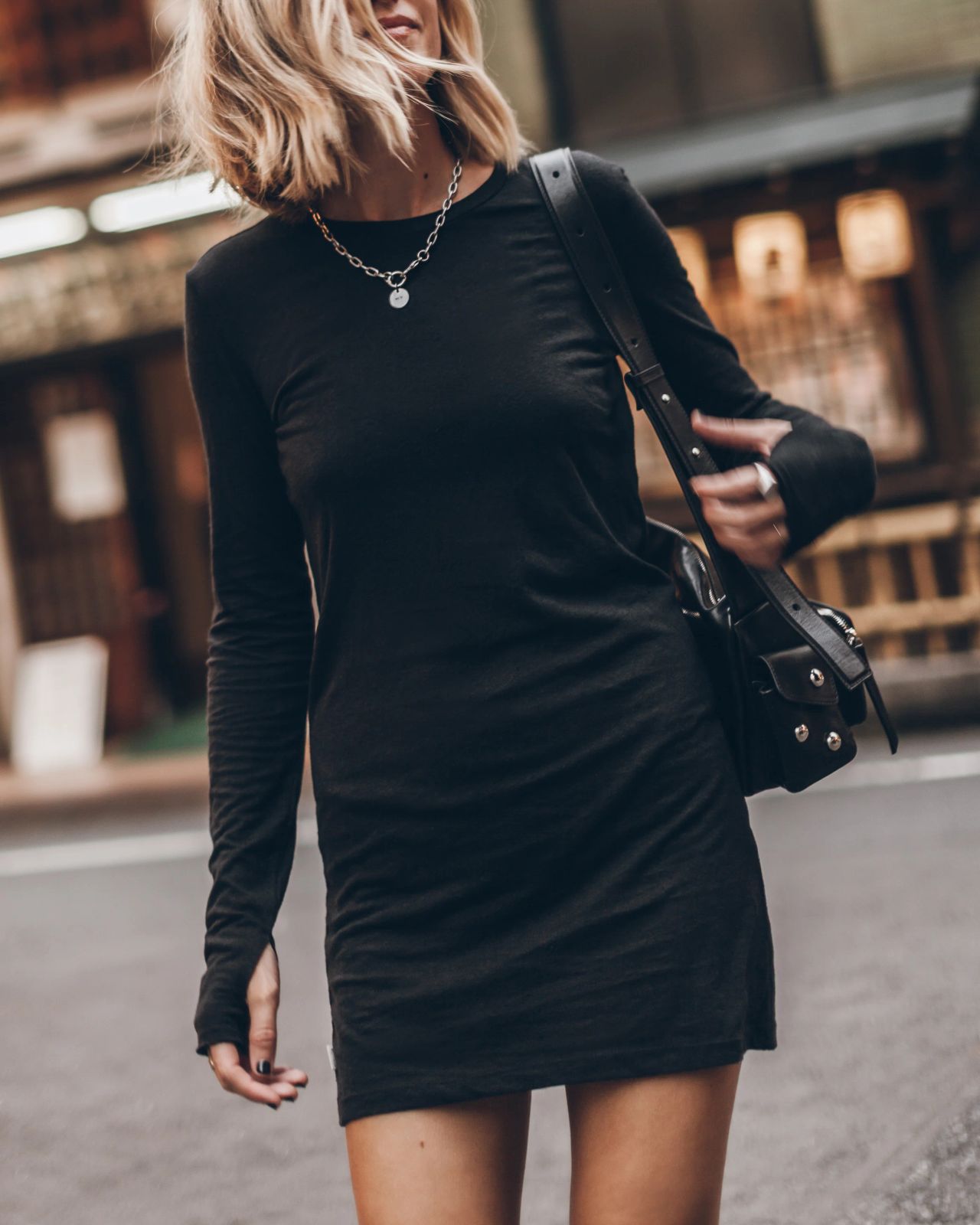 Fitted Black Mini Dress with Thumbhole Cuffs Fitted Black Mini Dress with Thumbhole Cuffs — Little Black Dress Outfits 2027