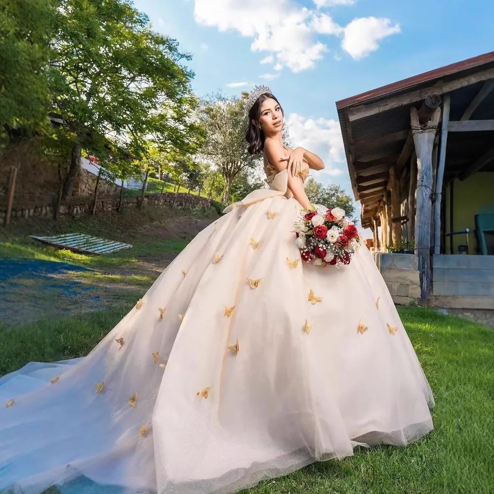 Strapless Champagne Ballgown with Glitter Tulle and Butterfly Appliques — Champagne Quinceanera Dress 2027
