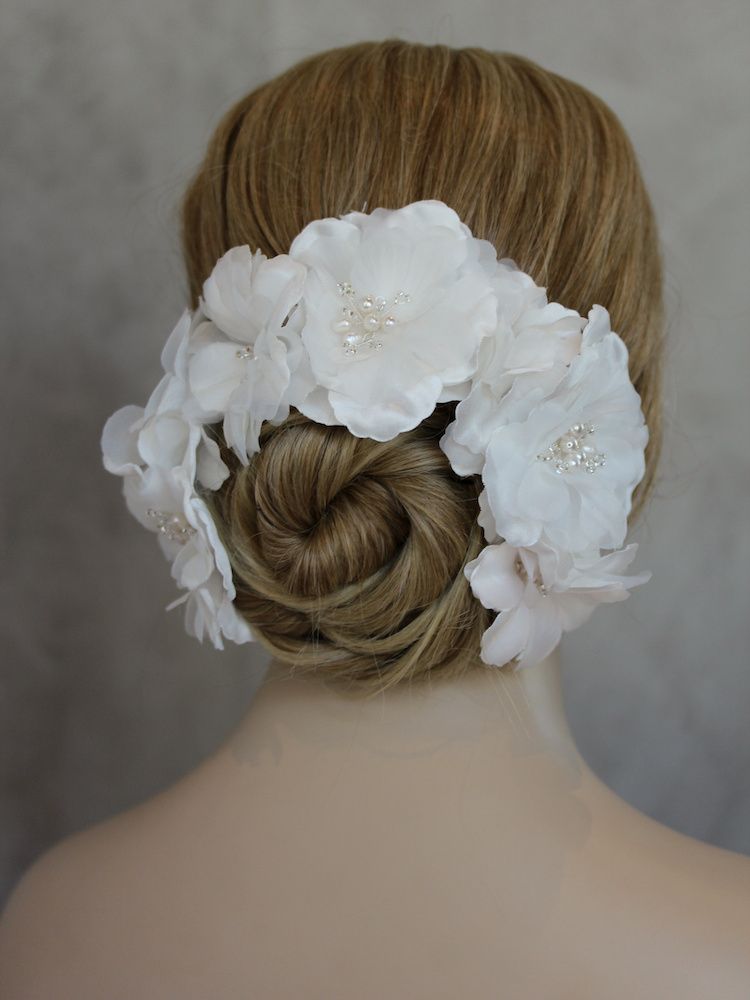 Smooth Twisted Bun With Floral Accessory — Filipino Wedding Hairstyles 2027