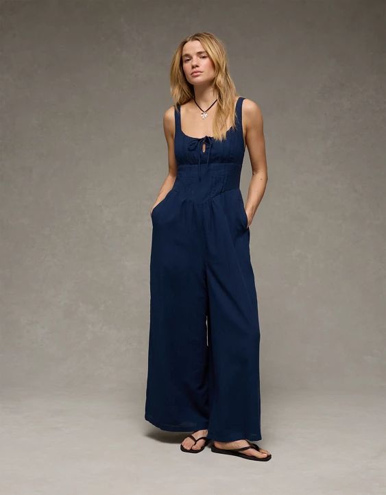 Navy Blue Square Neck Jumpsuit with Tie Detail and Flip-Flops Navy Blue Square Neck Jumpsuit with Tie Detail and Flip-Flops — Sleeveless Jumpsuit Outfits 2027