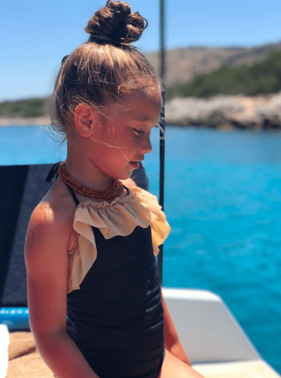 Visual Idea — Messy Bun On Top Of Her Head — Little Girl Swim Hairstyles 2027