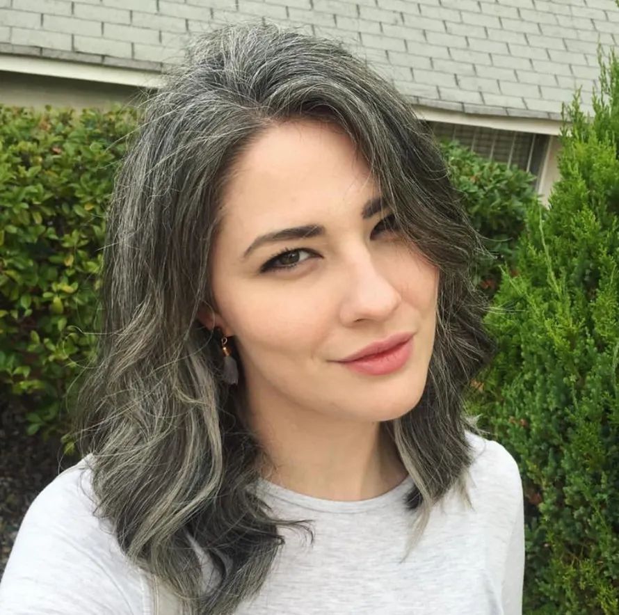 Gray With Darker Undertones Collarbone Wavy Blowout With Gray Transition — Transitioning to Gray Hair 2027