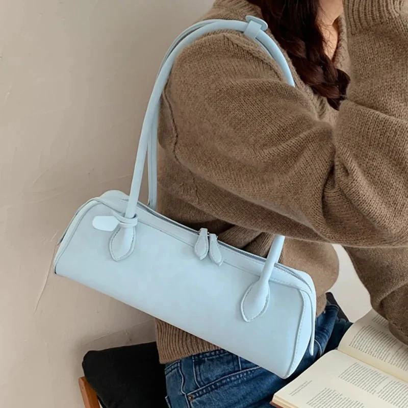 Brown Knit Sweater and Light Blue Suede Baguette Bag Brown Knit Sweater and Light Blue Suede Baguette Bag — Baguette Bag Aesthetic 2027