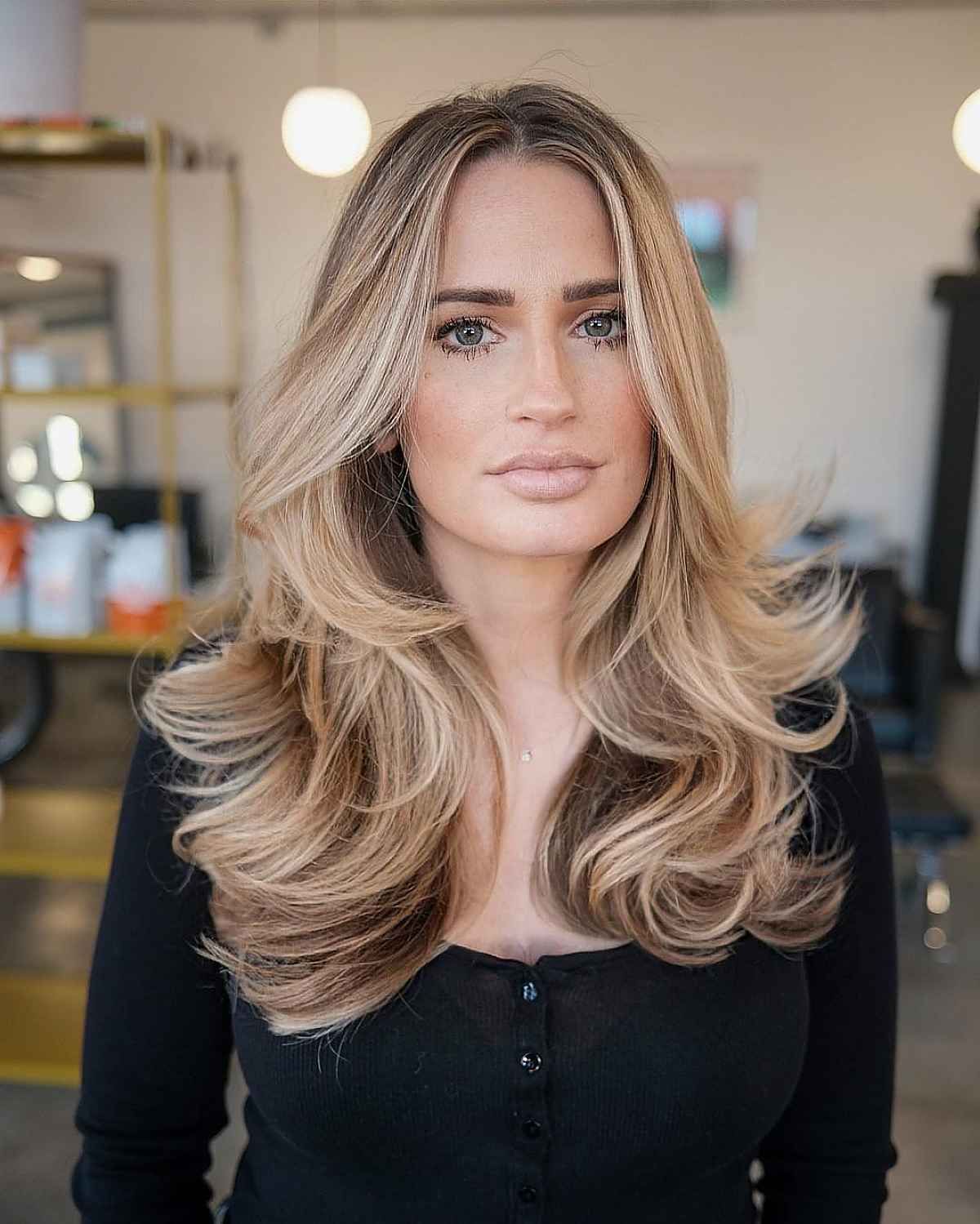 Voluminous Ash Blonde Blowout With Curtain Bangs Voluminous Ash Blonde Blowout With Curtain Bangs — Hair Color 2027 for Square Face