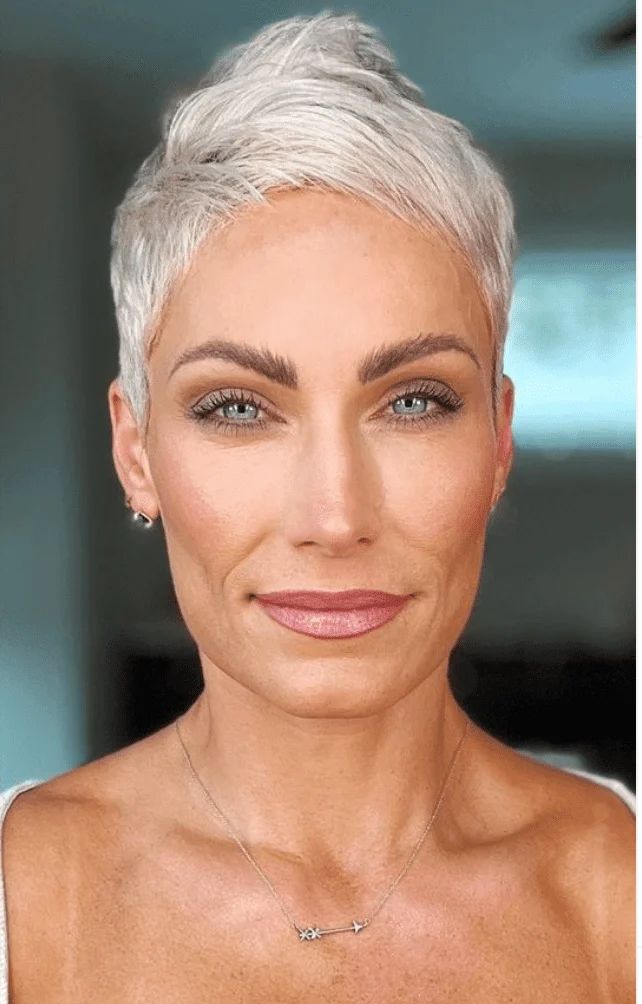 Sleek Silver Pixie With Side-Swept Bangs Sleek Silver Pixie With Side-Swept Bangs — Silver Pixie 2027