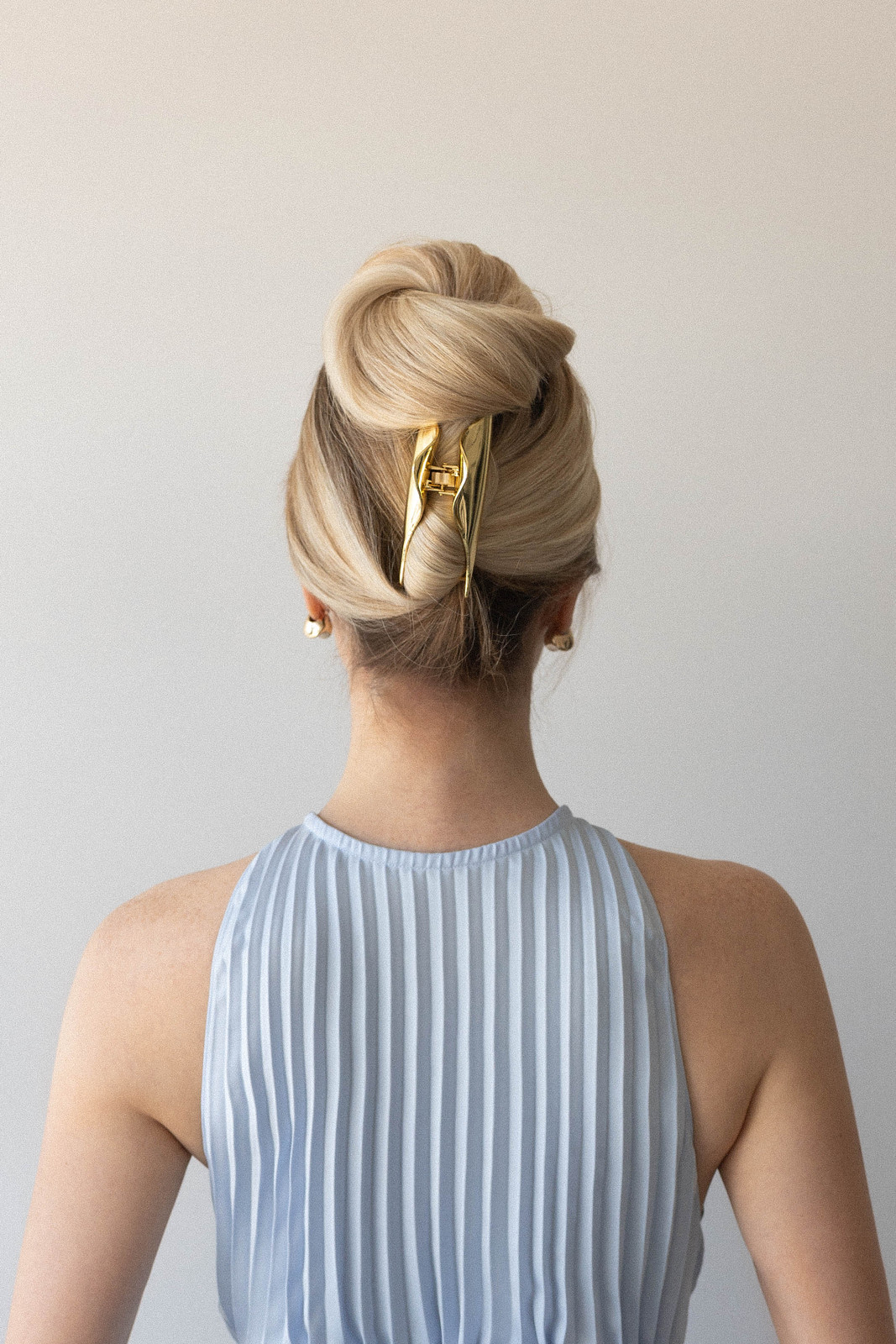 Sleek Blonde Twist Bun Sleek Blonde Twist Bun — Claw Clip Twist Hairstyles 2027