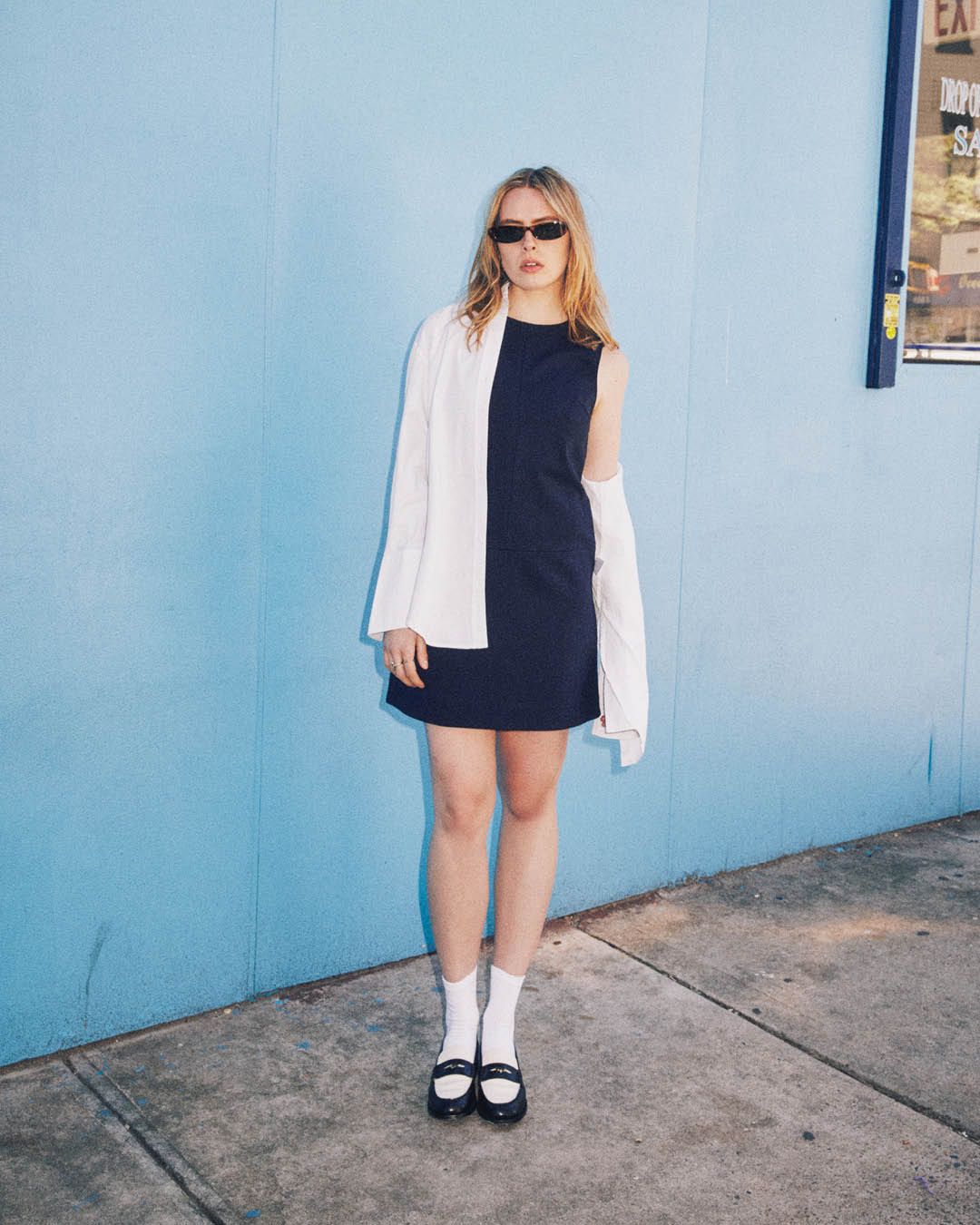 White Top and Black Wide-Leg Trousers for a Minimalist Monochrome Look — Minimal Scandinavian Outfits 2027