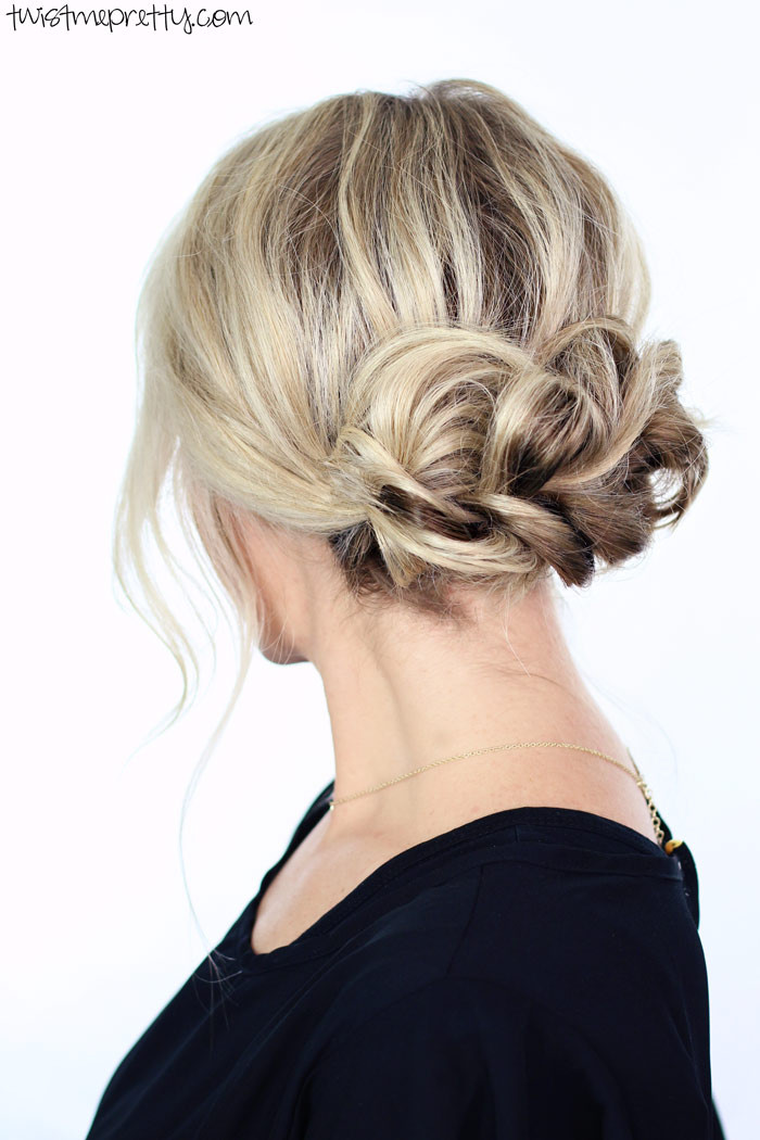 Textured Low Updo With Face-Framing Tendrils Textured Low Updo With Face-Framing Tendrils — Christmas Photo Hairstyles 2026