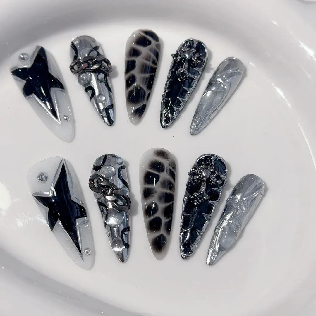 Visual Idea — Both Hands Are Shown In A Close-Up View Visual Idea — Both Hands Are Shown In A Close-Up View — Snake Print Nails 2027
