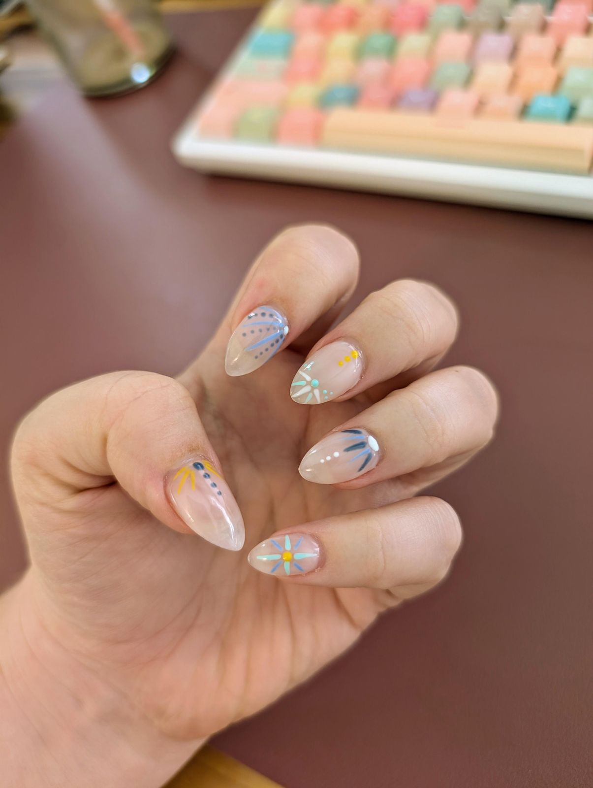 Medium Almond Sheer Blue Yellow Motifs Medium Almond Sheer Blue Yellow Motifs — Minimal Line Art Nails 2027