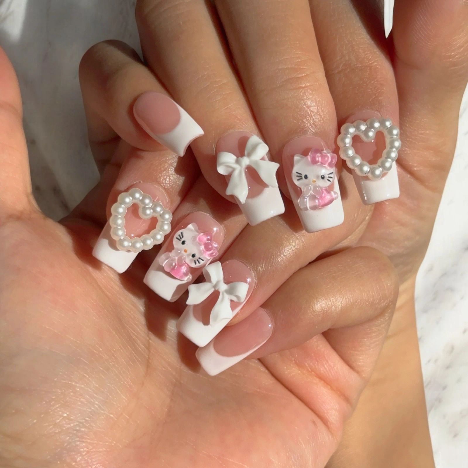 Classic French with Hello Kitty Accents Classic French with Hello Kitty Accents — French Hello Kitty Nails 2027