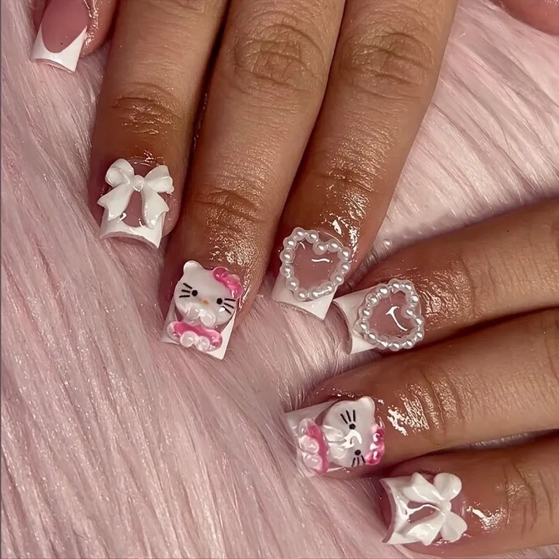 Short Press-Ons with 3D Hello Kitty Charms Short Press-Ons with 3D Hello Kitty Charms — French Hello Kitty Nails 2027
