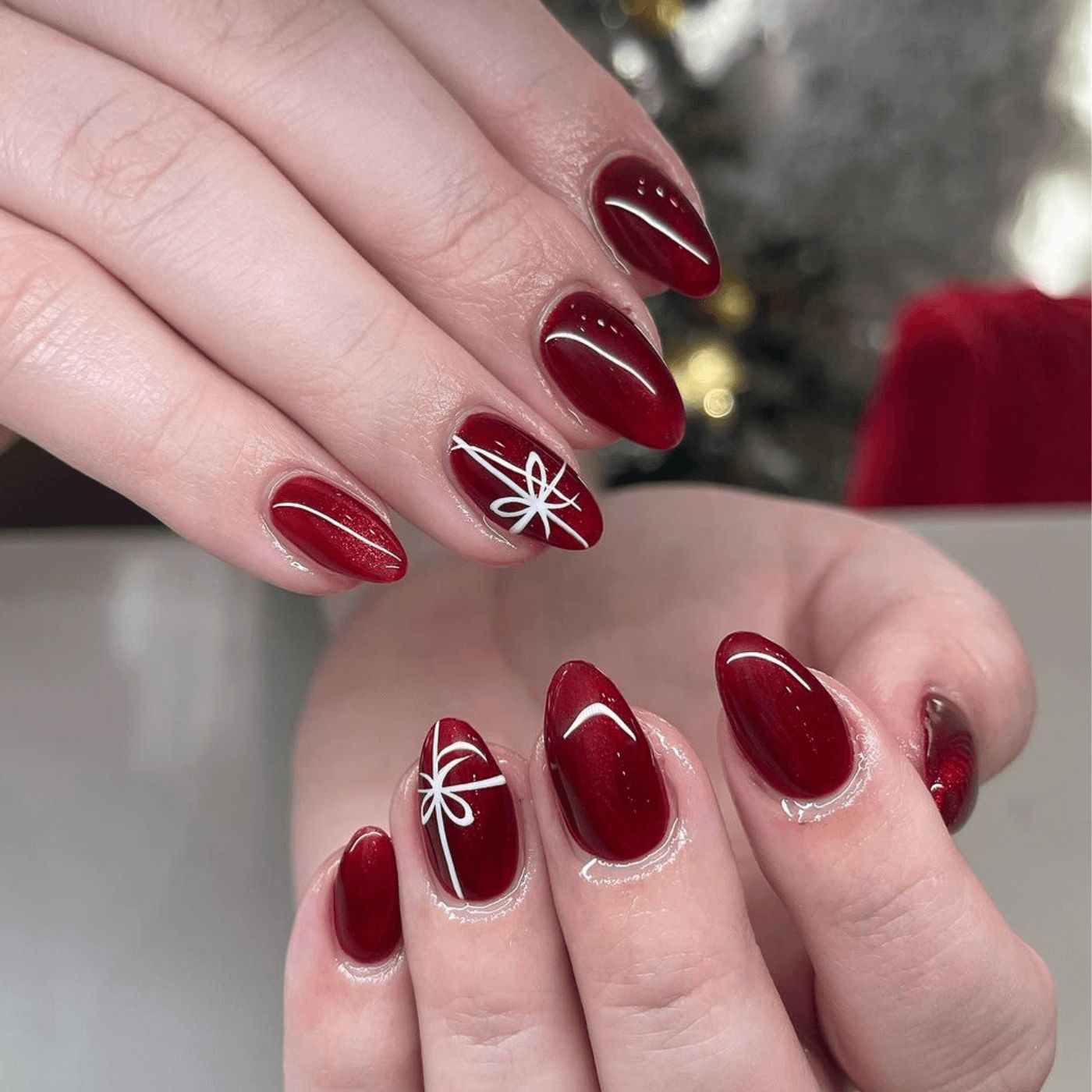 Deep Red Glossy Nails with Ribbon Art Deep Red Glossy Nails with Ribbon Art — Winter Formal Nails 2027