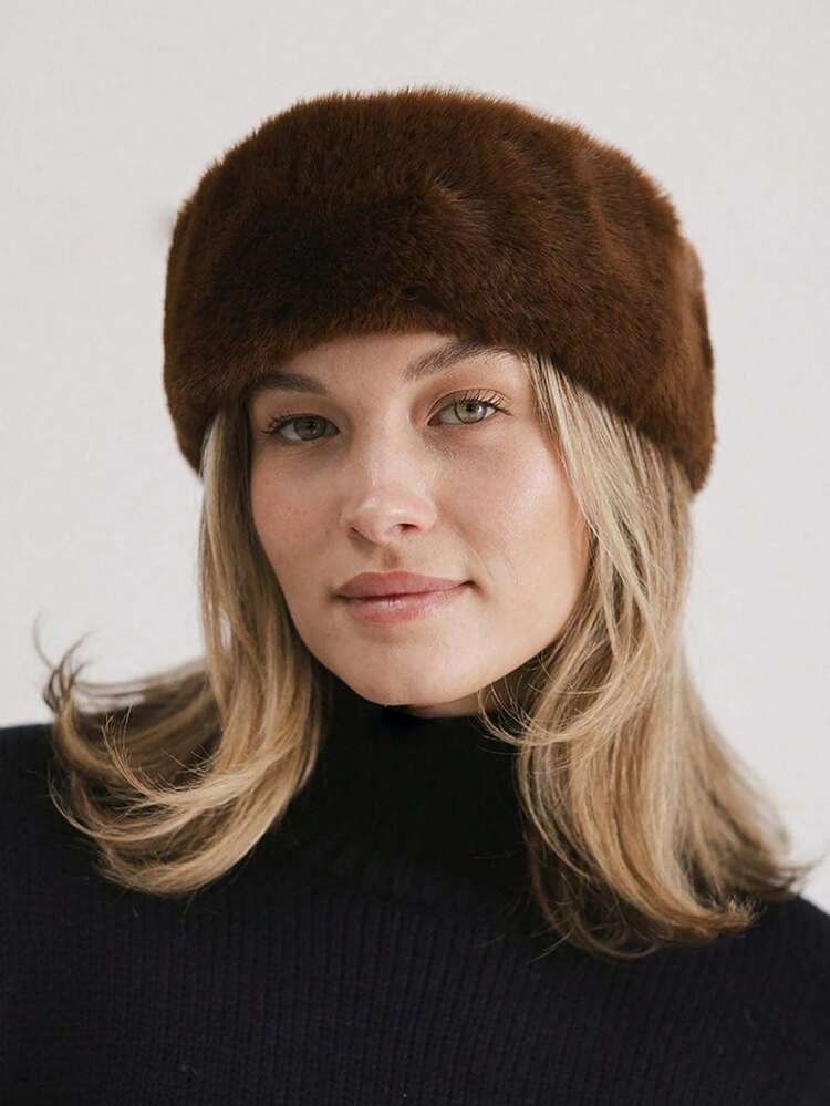 Visual Idea — A Woman With Medium Winter Headband Hairstyles 2027