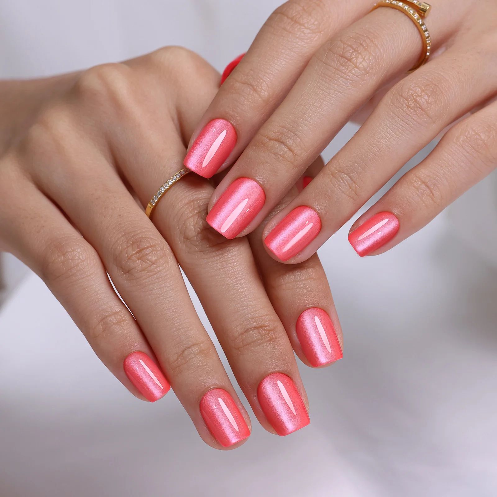 Shimmering Coral Cat Eye Nails Shimmering Coral Cat Eye Nails — Short Coral Nails 2027