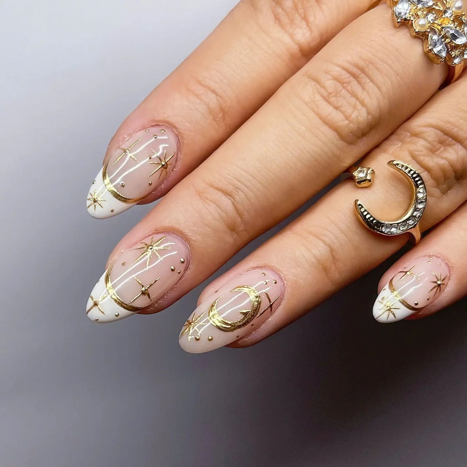 Nude French Tips with Gold Celestial Accents — Moon and Stars Nails 2027