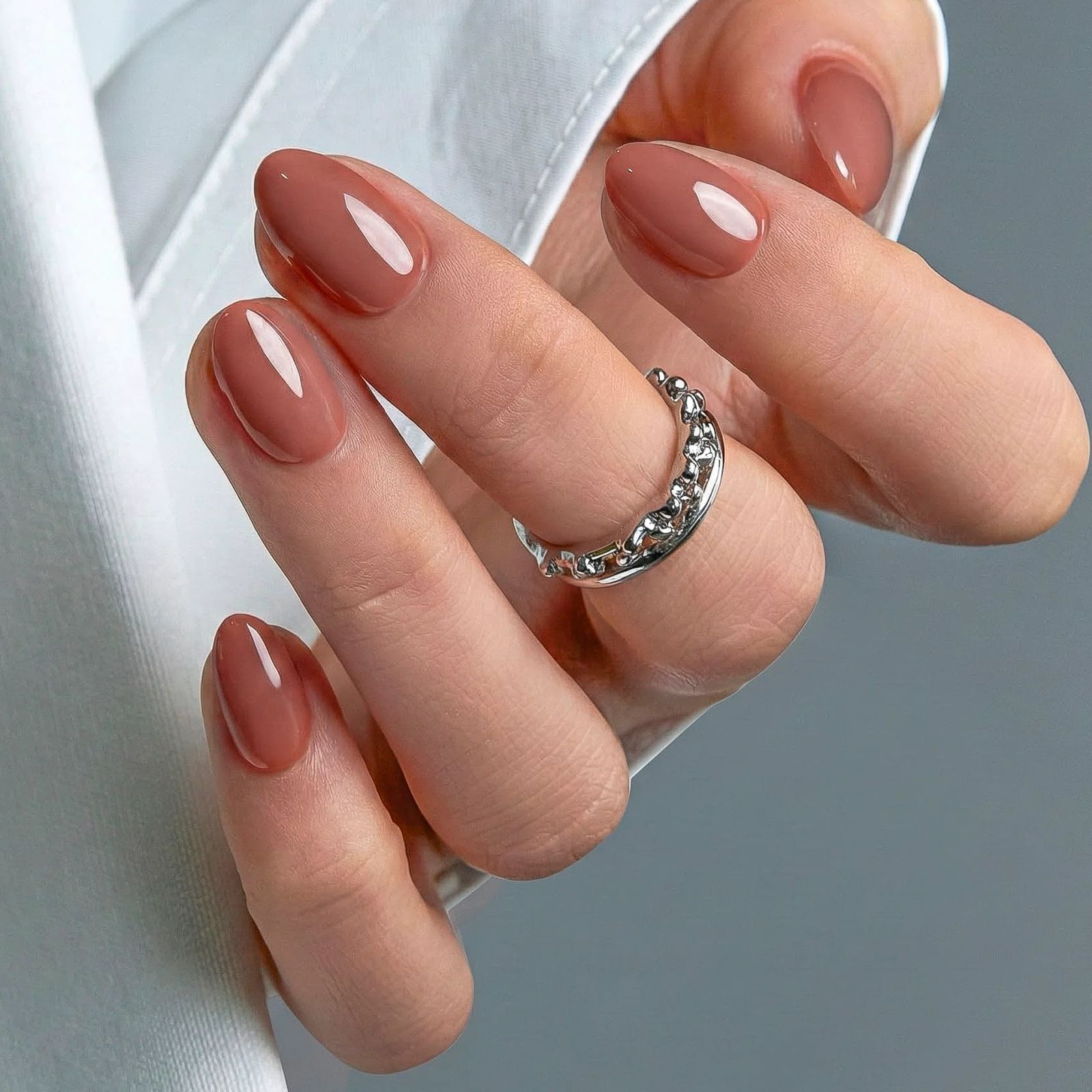 Medium Brown Glossy Short Almonds — Almond Nails 2027 for Chubby Fingers