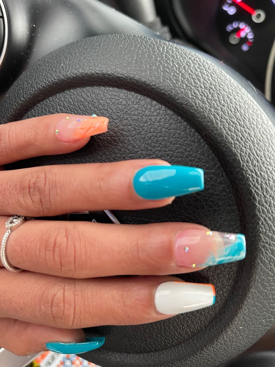 Visual Idea — The Hand Is Posed Against A Dark Visual Idea — The Hand Is Posed Against A Dark — Swim Nails Team Colors 2027