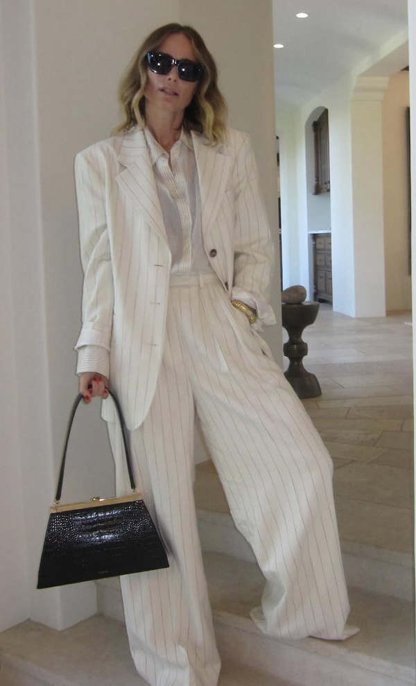 Chic Ensemble: White Pinstripe Pantsuit with Sheer Top Chic Ensemble: White Pinstripe Pantsuit with Sheer Top — Pinstripe Pants Outfits 2027