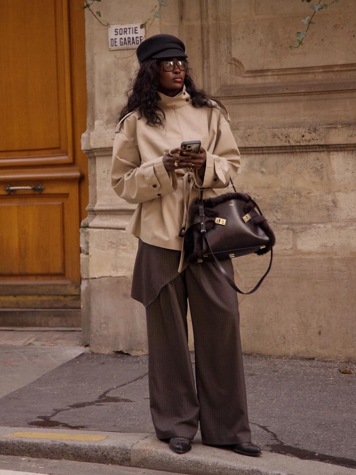 Sophisticated Layers: Beige Trench, Pinstripe Trousers, and Draped Skirt — Cold Weather Outfits 2027