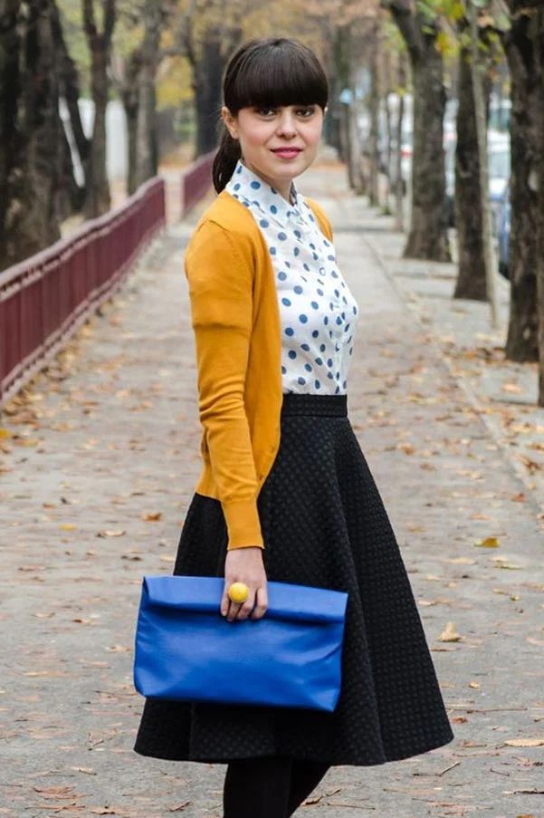 Yellow Cardigan over Polka Dot Blouse and Black Skirt — Church Outfits 2027