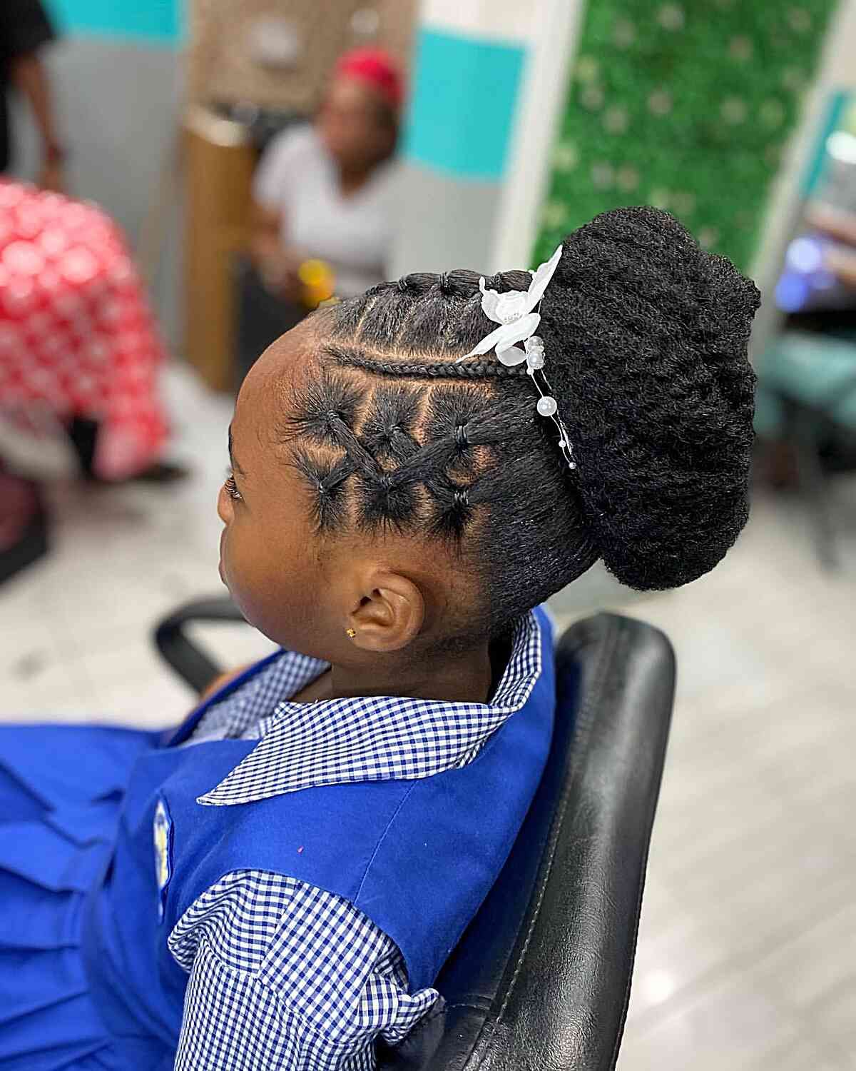 Geometric Braids Styled into a Chic Bun — Knotless Braids 2027 for Little Girls