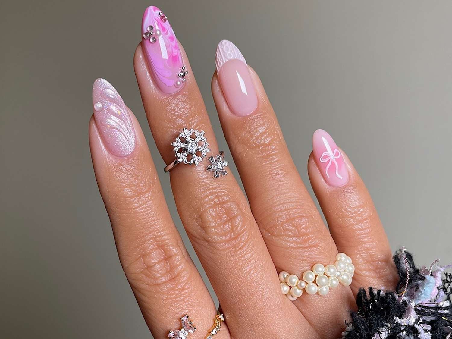 Long Almond Pink Marble Bow Long Almond Pink Marble Bow — Sparkly Holiday Nails 2026