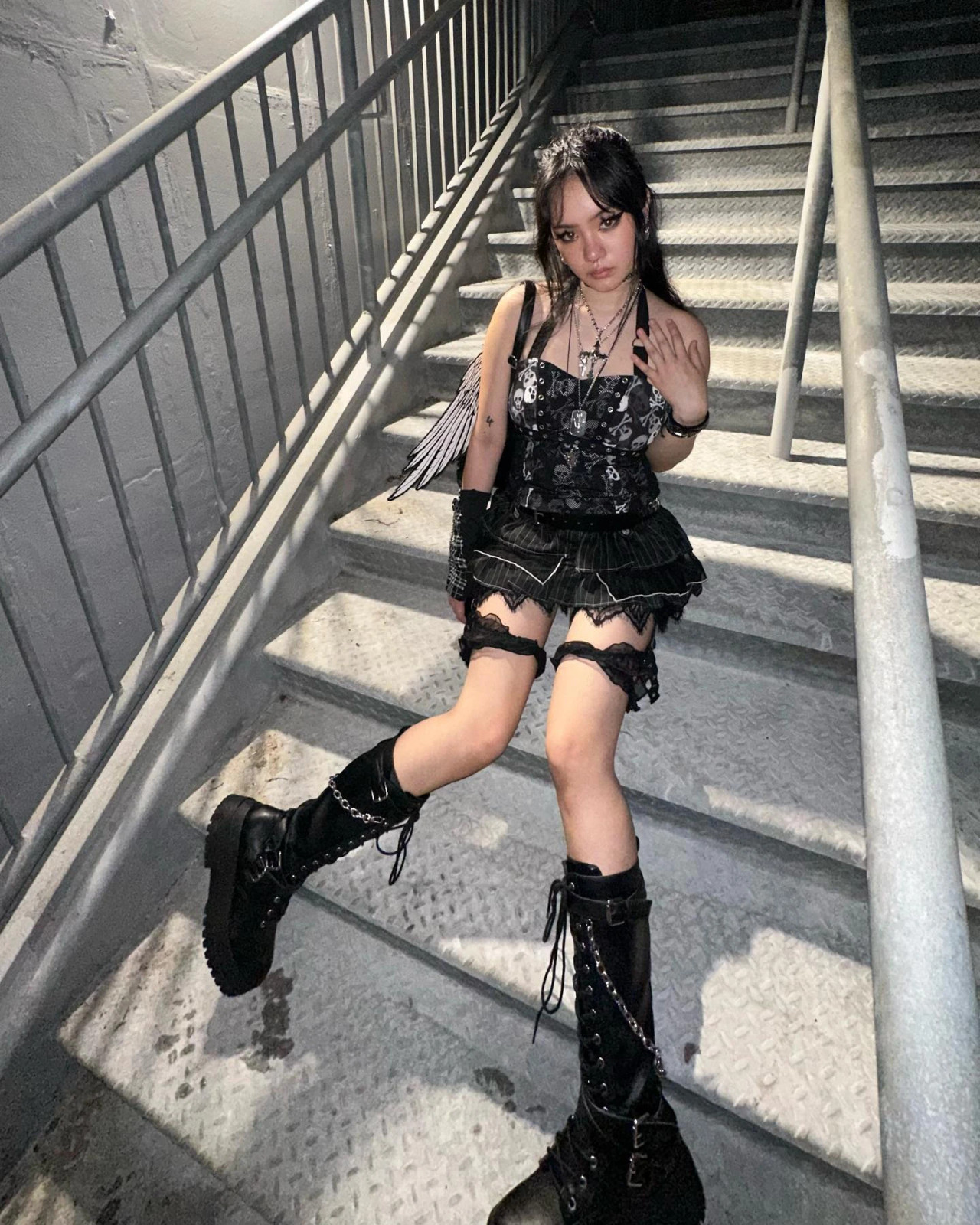Concert Ready: Skull Halter, Ruffled Skirt, and Combat Boots Concert Ready: Skull Halter, Ruffled Skirt, and Combat Boots — Fairy Grunge Outfits 2027