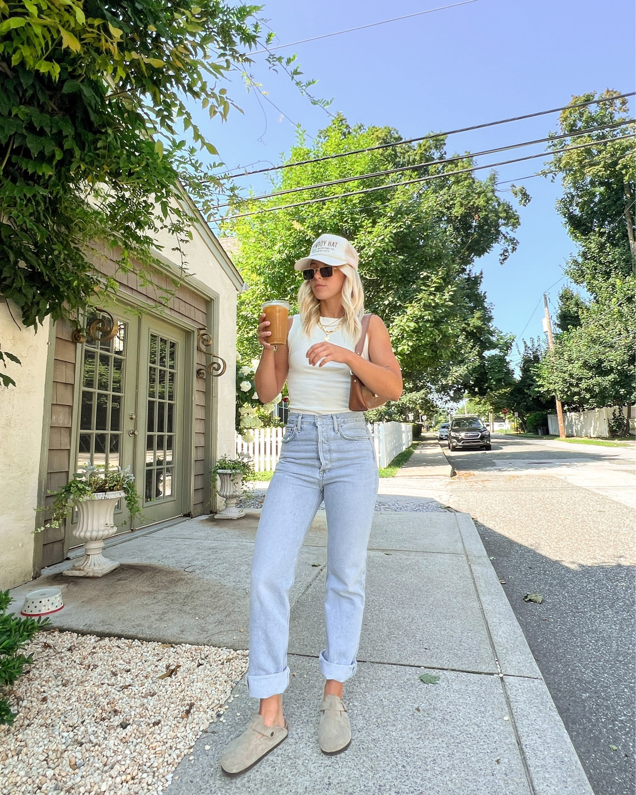 White Tank Top with Tan Clogs and Straight-Leg Jeans White Tank Top with Tan Clogs and Straight-Leg Jeans — Bootcut Jeans Outfits 2027 with Birkenstocks