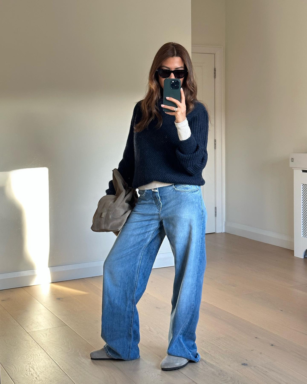 Navy Knit Sweater with Grey Birkenstocks and Oversized Bootcut Jeans Navy Knit Sweater with Grey Birkenstocks and Oversized Bootcut Jeans — Bootcut Jeans Outfits 2027 with Birkenstocks