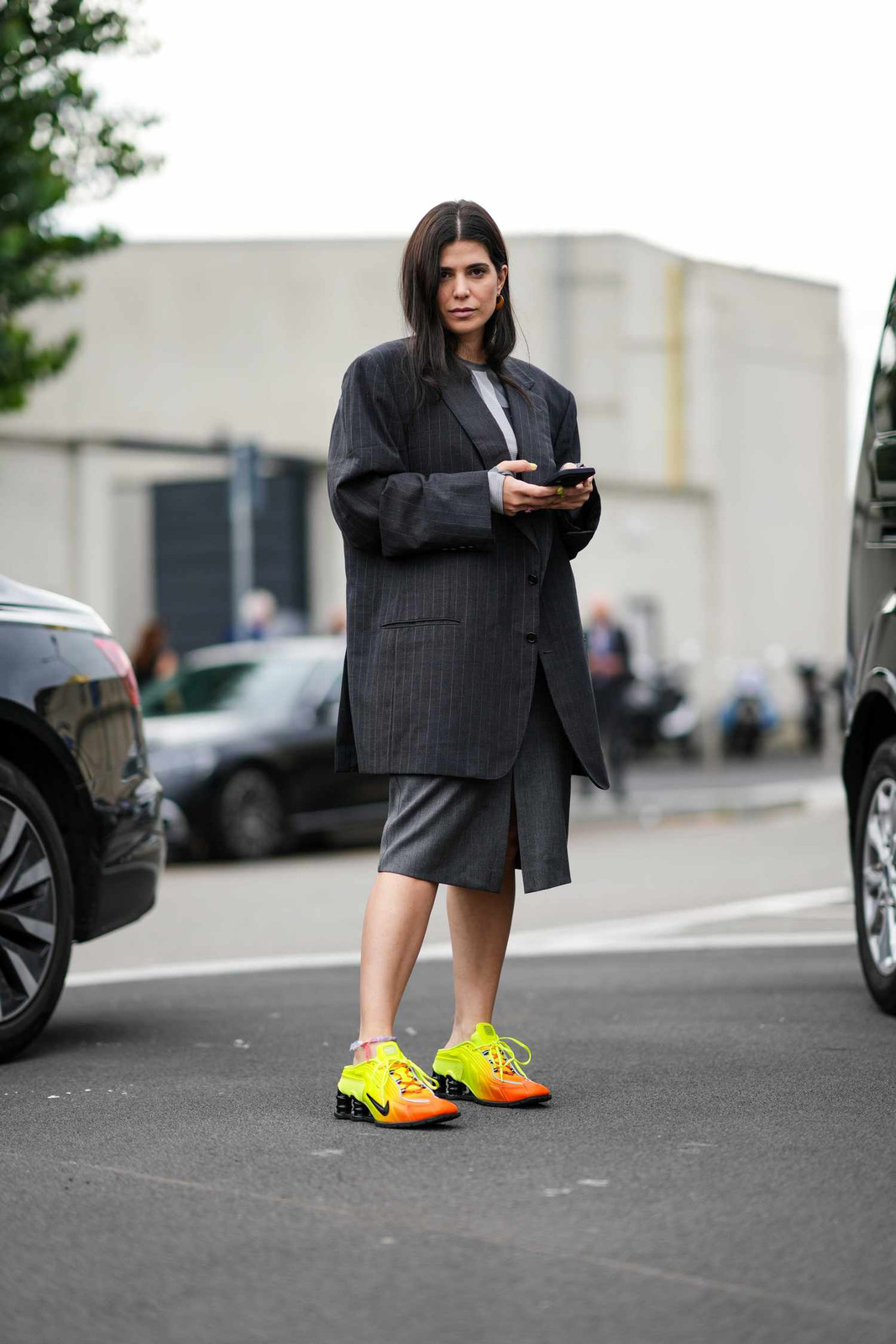 Bold Neon Dad Sneakers Elevate a Monochrome Look Bold Neon Dad Sneakers Elevate a Monochrome Look — Dad Sneakers Outfits 2027