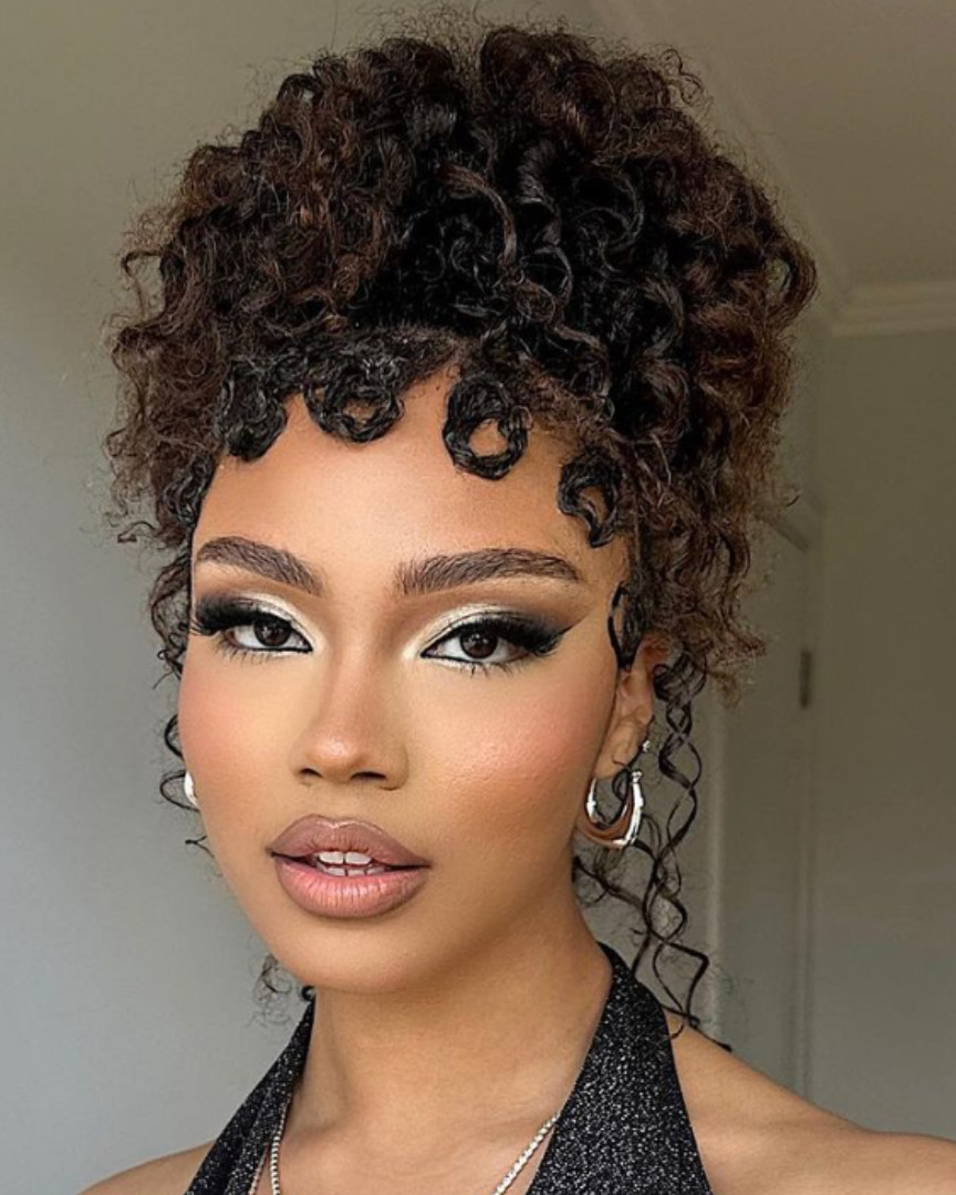 Updo With Sculpted Baby Bangs Updo With Sculpted Baby Bangs — Graduation Hairstyles Curls 2027