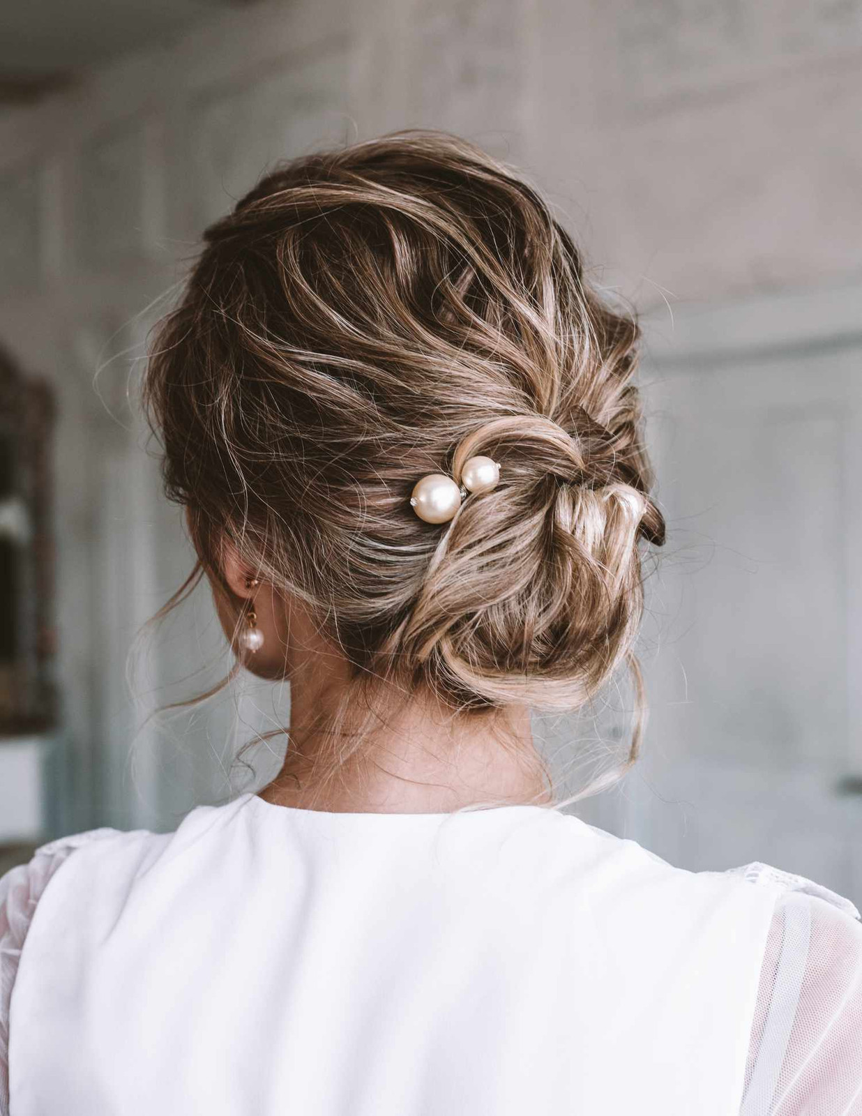 Loose Messy Updo With Pearl Pins Loose Messy Updo With Pearl Pins — Christmas Photo Hairstyles 2026